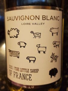 a wine label with cute little sheep on it